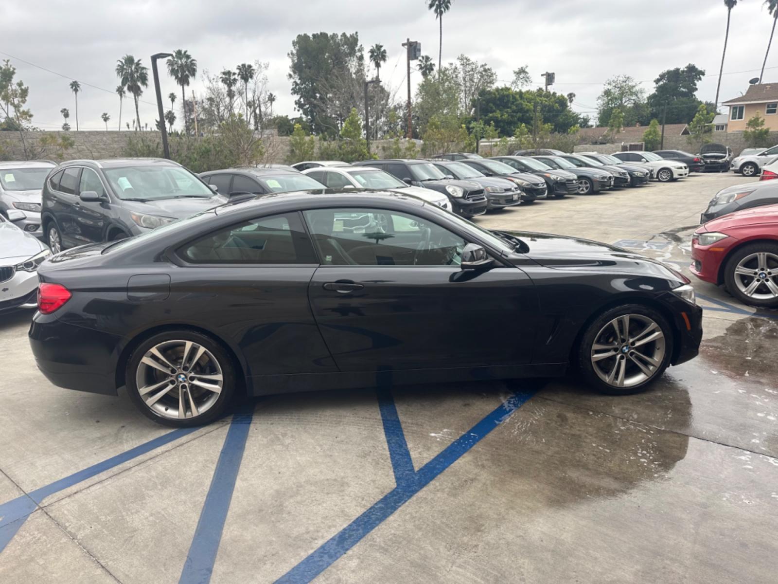 2015 Black BMW 4-Series 435i coupe (WBA3R1C55FK) with an 3.0L V6 DOHC 24V engine, 8-Speed Automatic transmission, located at 30 S. Berkeley Avenue, Pasadena, CA, 91107, (626) 248-7567, 34.145447, -118.109398 - Crown City Motors is a used “Buy Here Pay Here” car dealer in Pasadena CA. “Buy Here Pay Here” financing, means that when you purchase your vehicle from our dealership, that you make the payments to the dealership as well. We do not need the banks approval to get you approved for a used auto - Photo #5